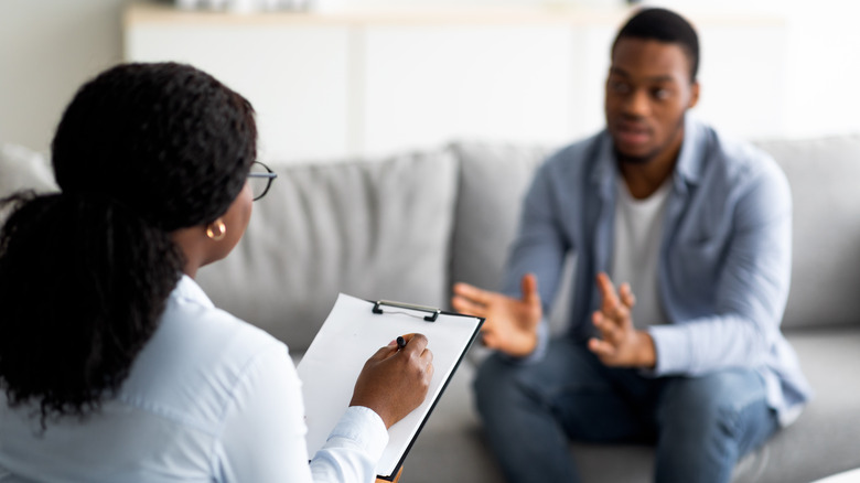 A man talks to a therapist