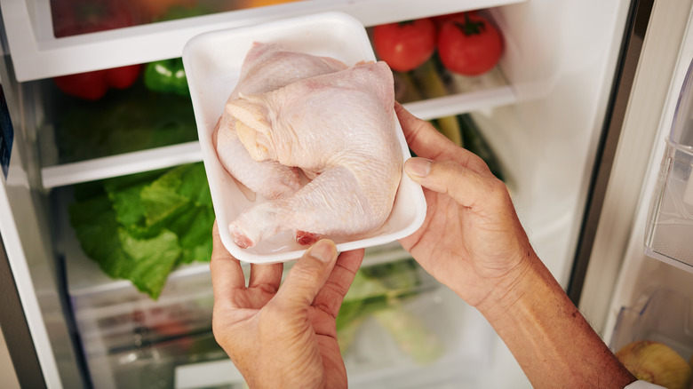 Removing raw chicken from refrigerator 
