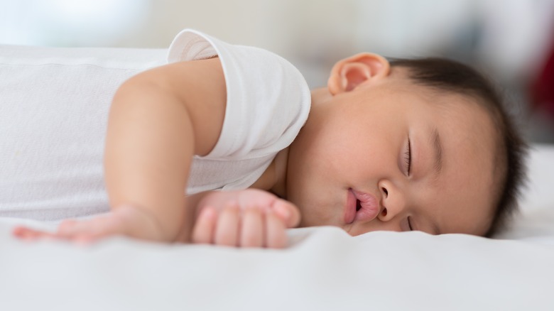 newborn lying down