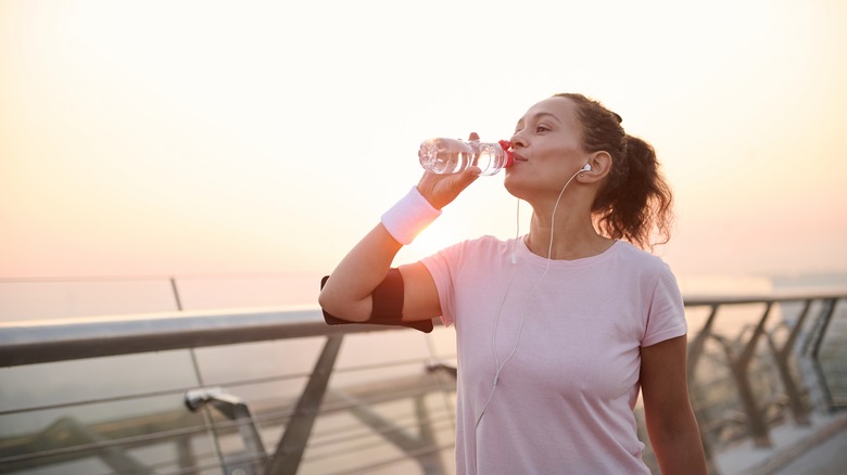 Woman drinking water bottle