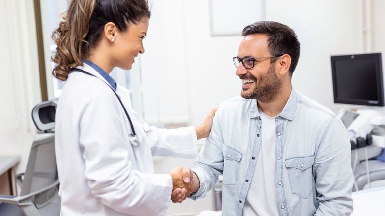 Doctor and patient shaking hands