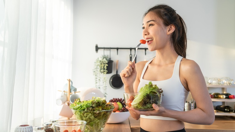 woman eating a salad