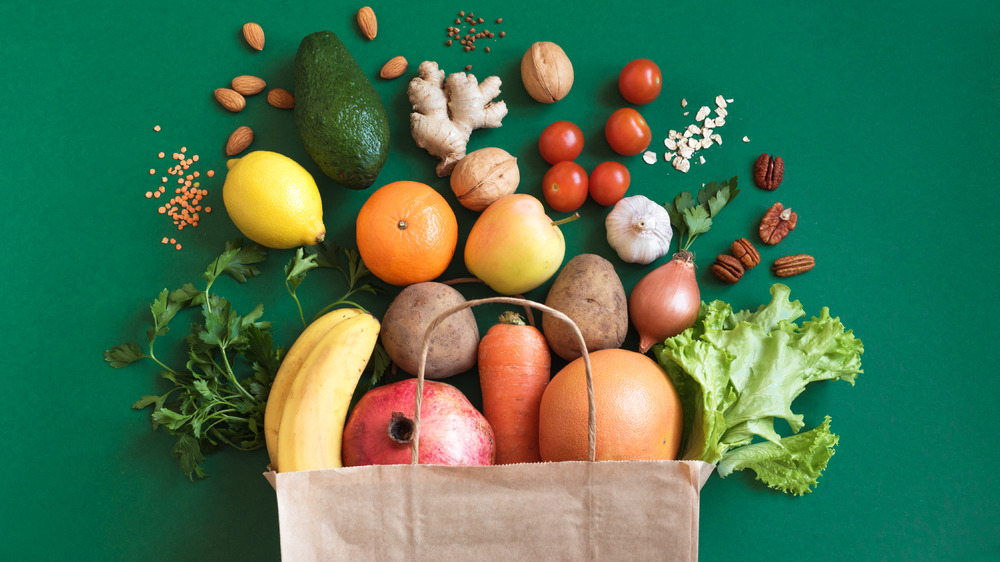 Paper bag full of vegetables 