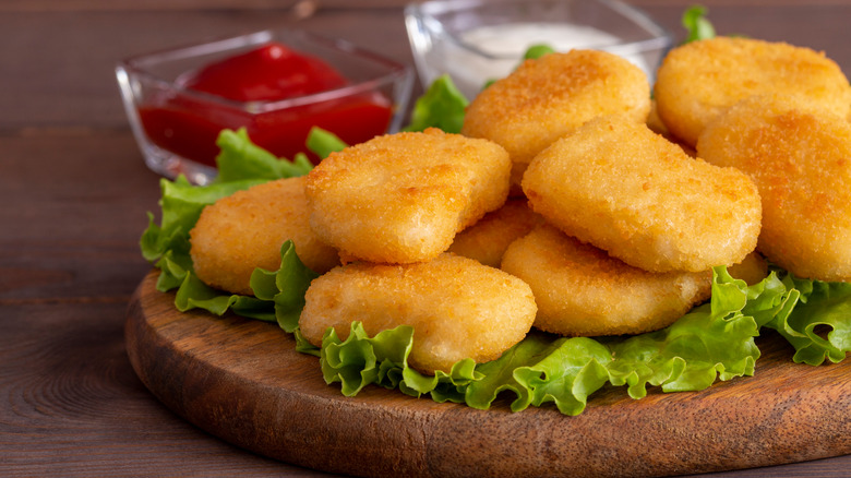 A plate of fried chicken nuggets