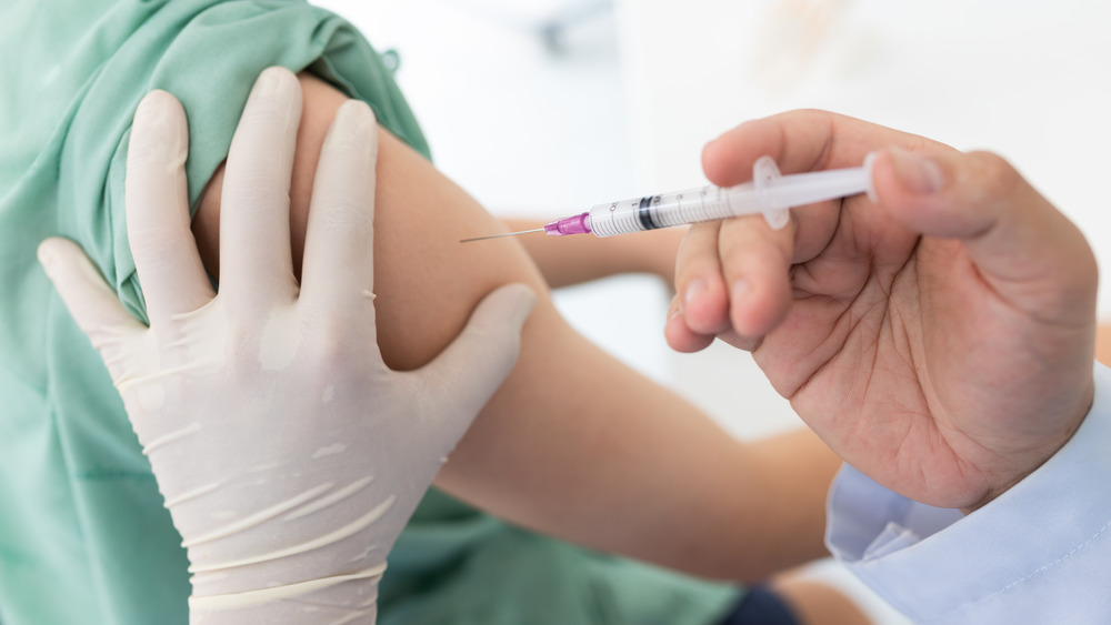 person getting vaccinated
