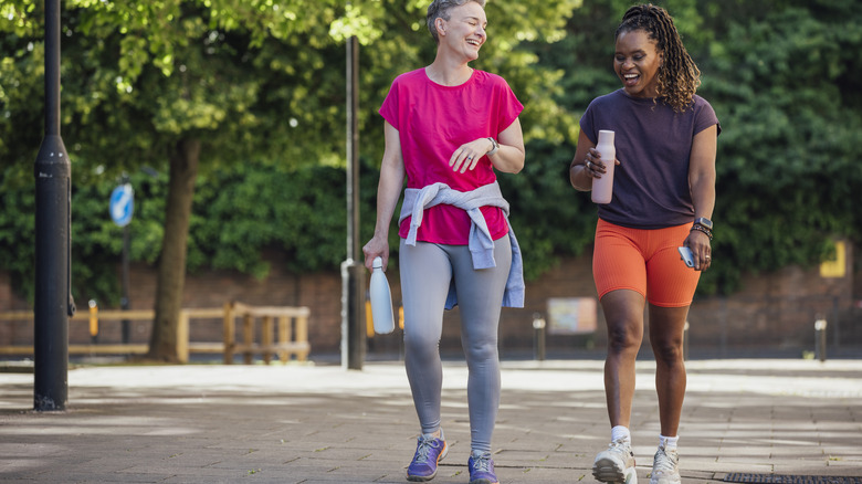 two friends walking for fitness
