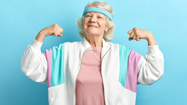 elderly woman flexing