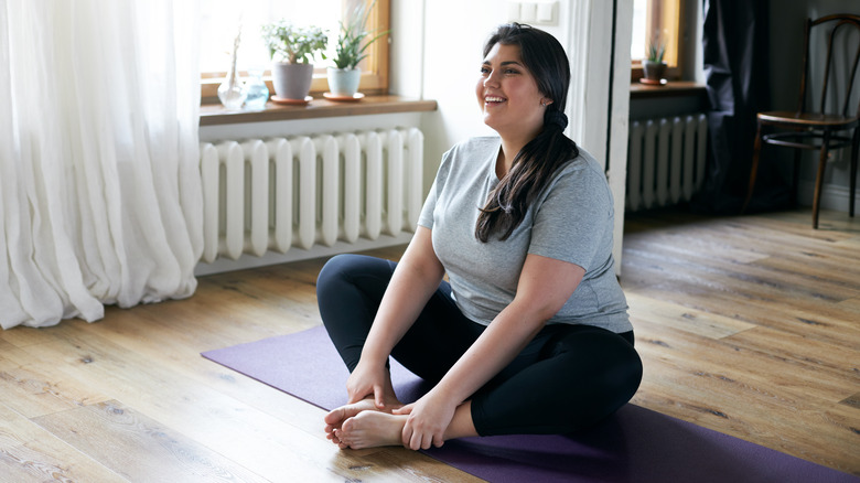 woman on yoga mat