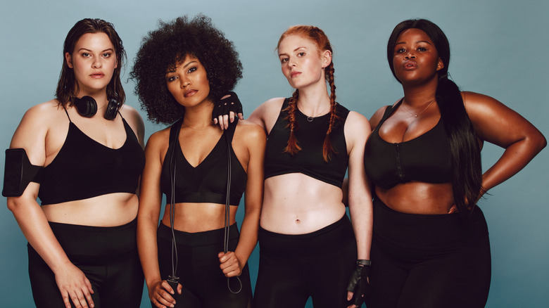 four women in workout clothes