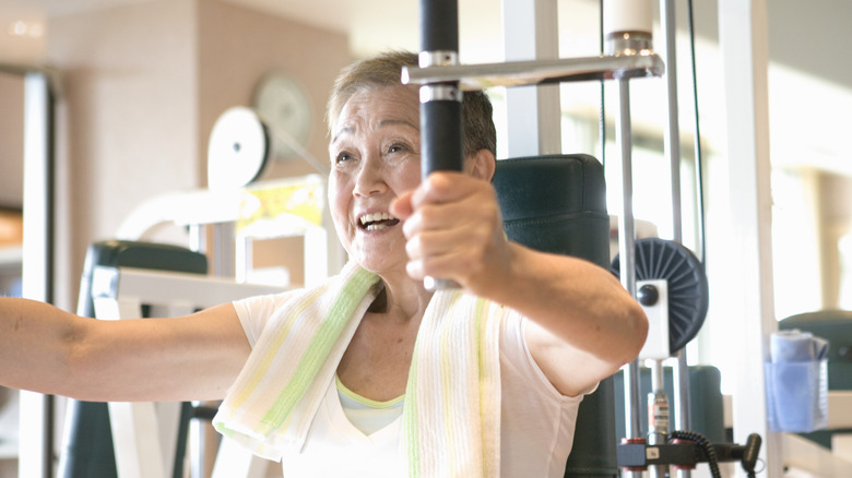 Individual working out on machine