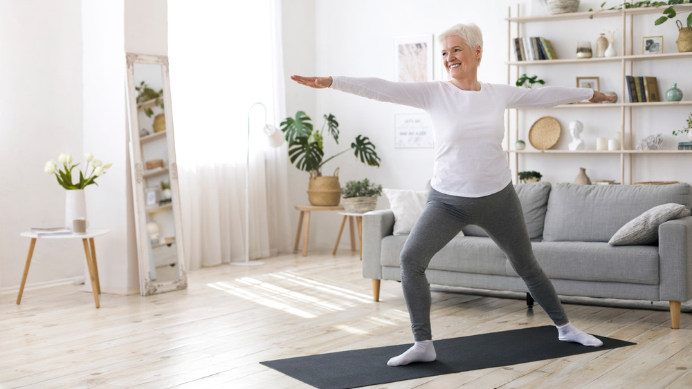 Older woman doing yoga 