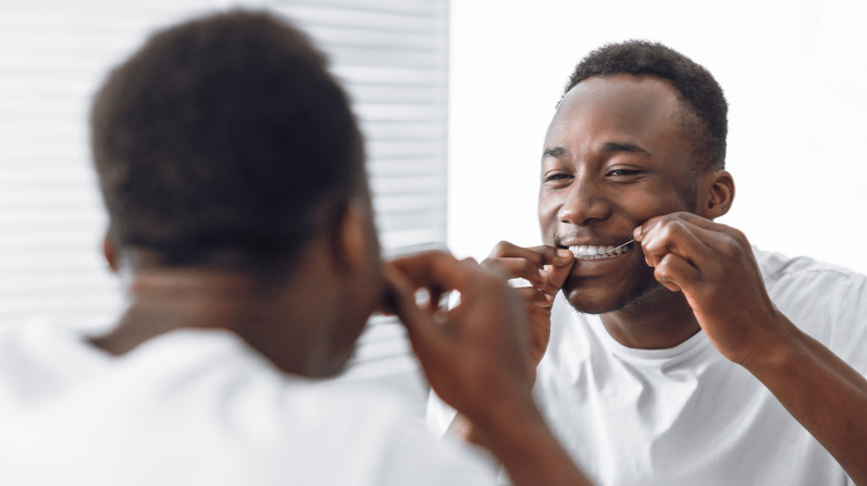 happy flossing guy