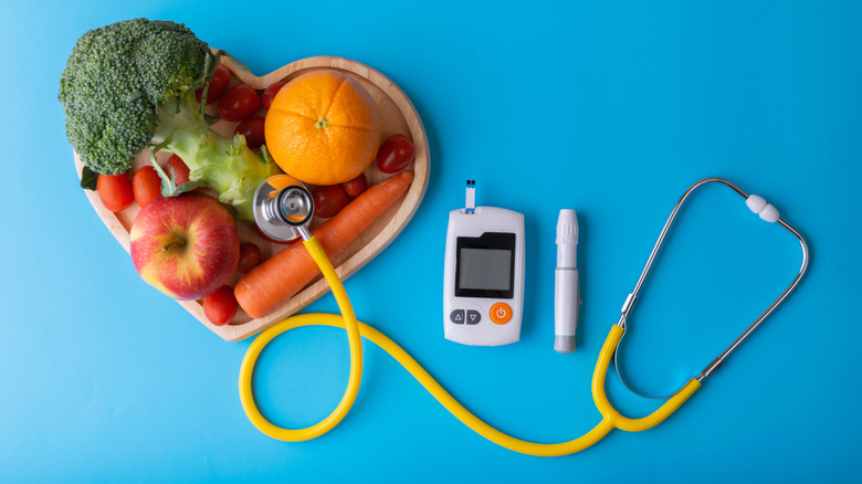 healthy foods, stethoscope, blood monitor