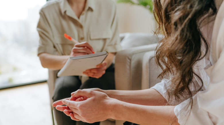 woman in therapy with a mental health professional