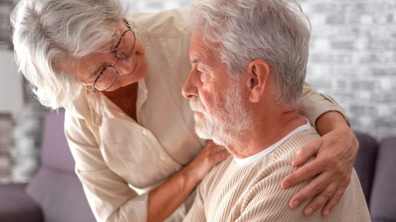 older couple having a loving moment with each other