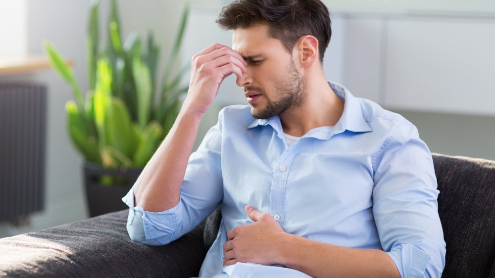 Stressed man with bloating