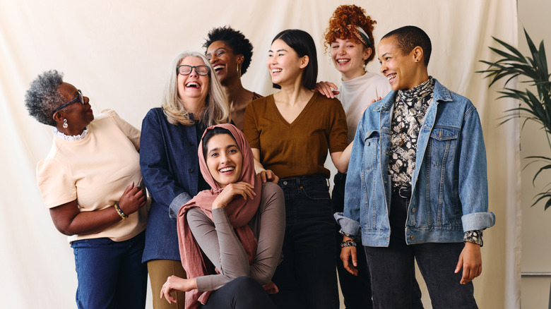 diverse women posing for photo