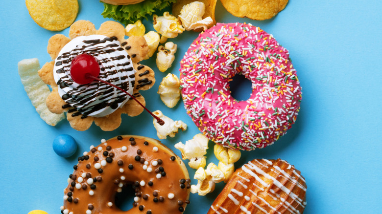 processed foods on blue background