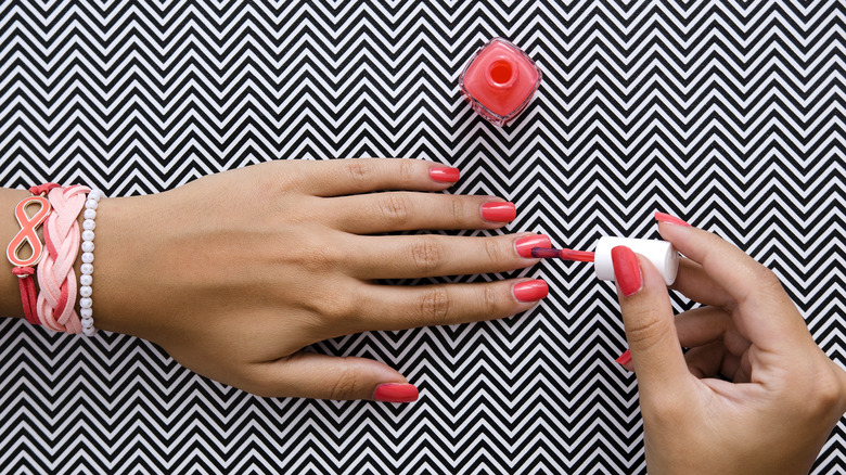 Person painting nails