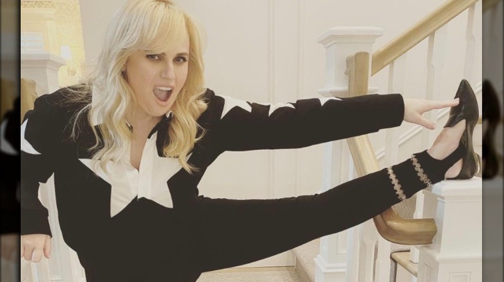 Rebel Wilson stretching