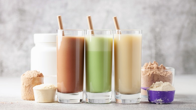 variety of protein shake flavors on a table