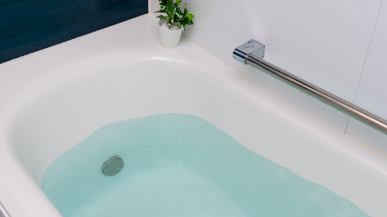 Bath tub with hot water