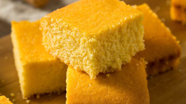 pieces of fresh cornbread on a table