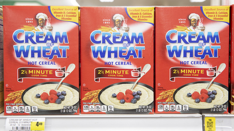 Boxes of Cream of Wheat lined up on the shelf 