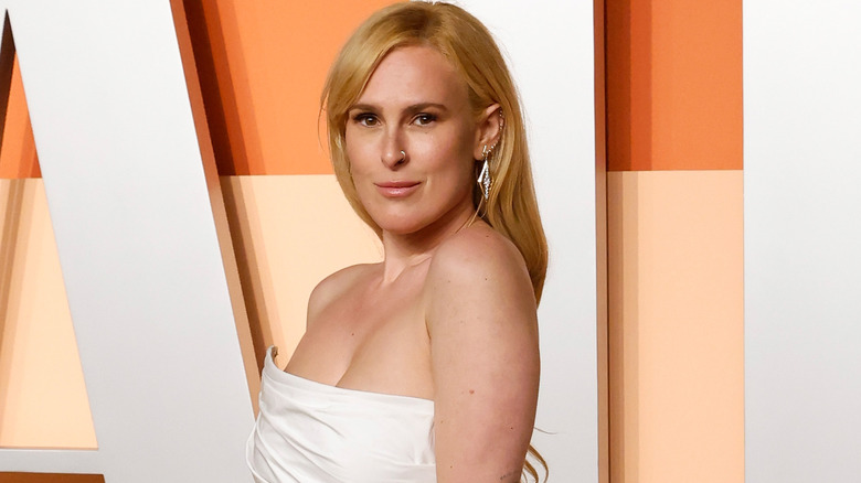 Rumer Willis and Bruce Willis posing
