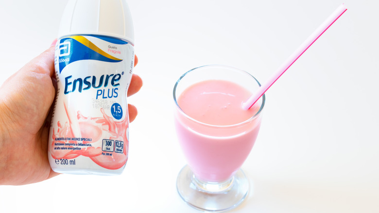 bottle of Ensure with drink in a glass