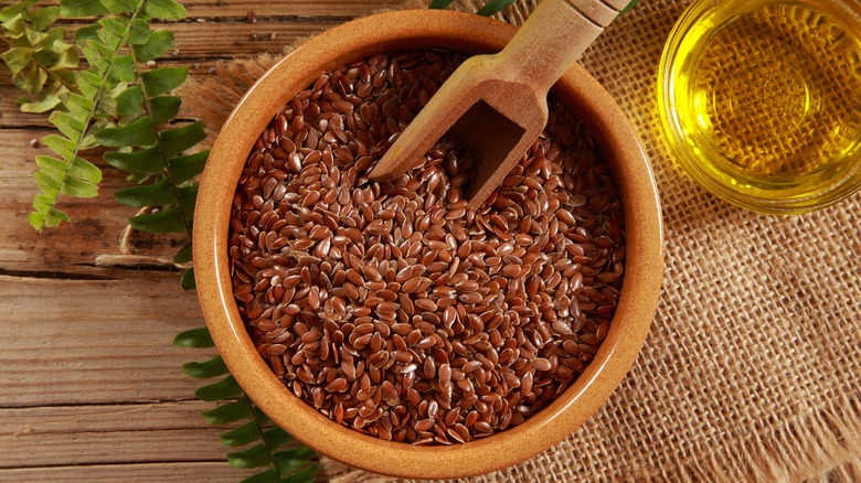 Wooden bowl of flaxseeds