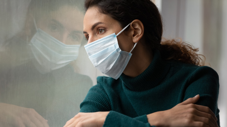 anxious man wearing mask