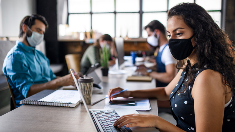 People wearing masks indoors