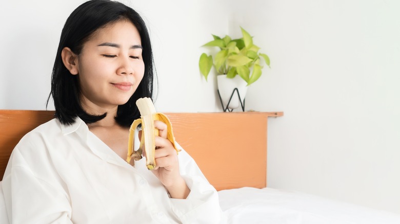 Eating a banana in bed