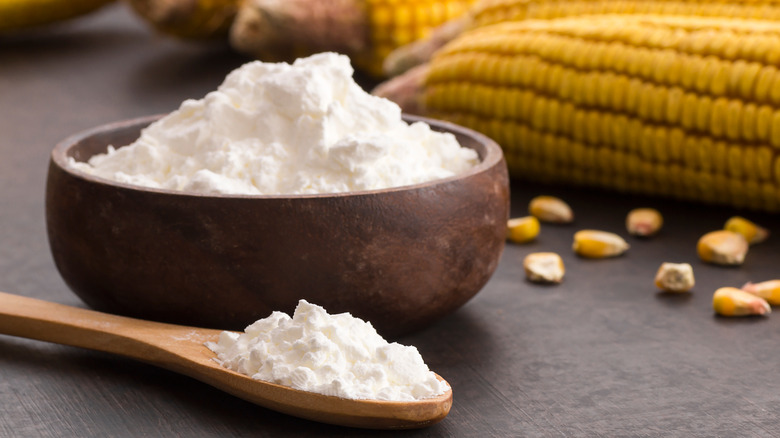 cornstarch in a bowl with corn in the background