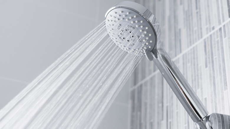 Shower head with water coming out 