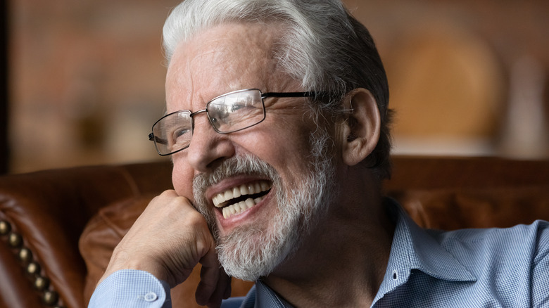 Older man smiling widely