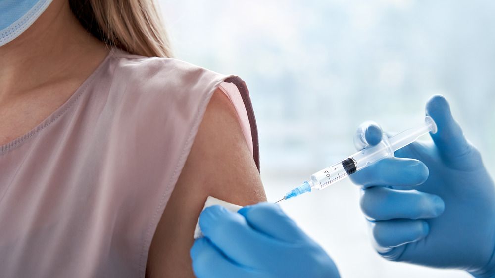 woman getting vaccinated