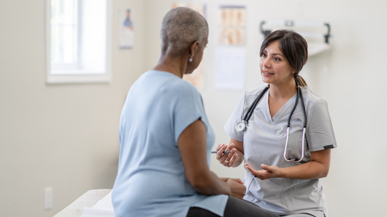 Woman talking to a doctor