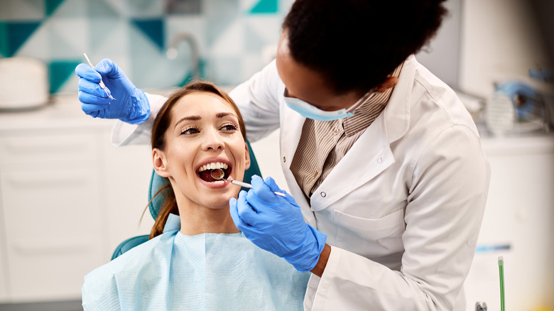 woman smiling at the dentist