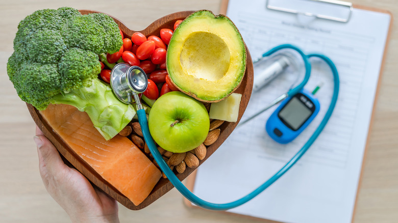 low carb food with glucometer in background