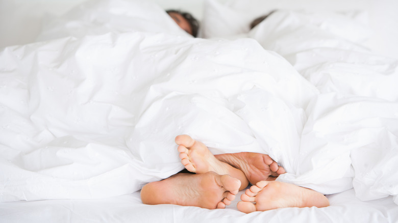 Couple in bed together