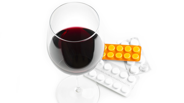 a glass of red wine and allergy medication 
