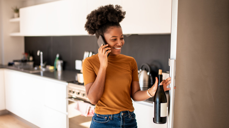 Woman drinking red wine