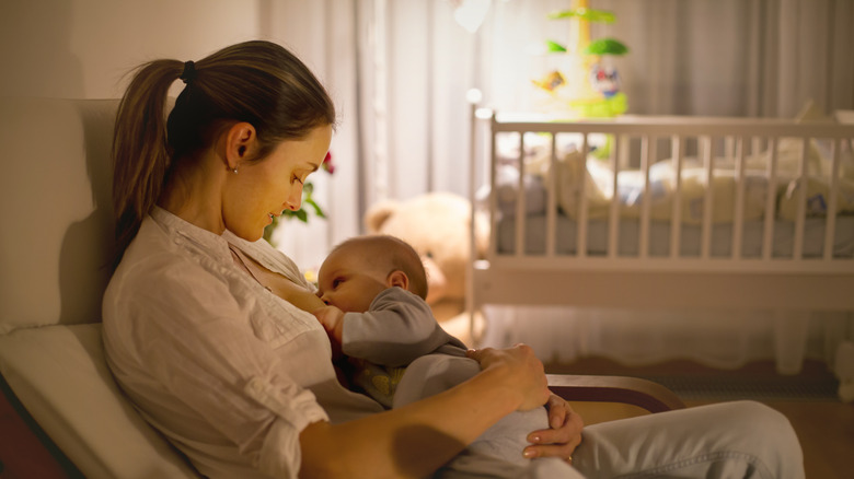 mom breast feeding baby