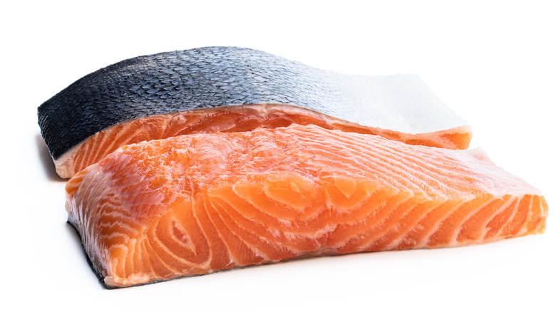 Two filets of raw salmon