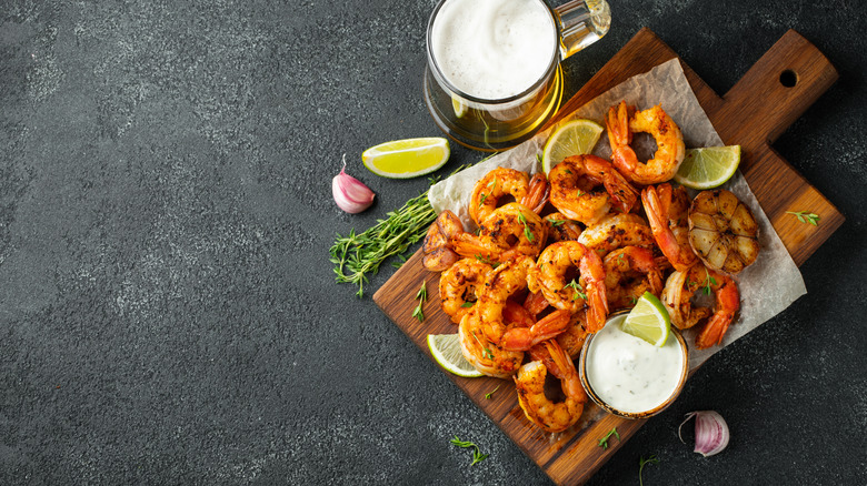 A plate full of cooked shrimp