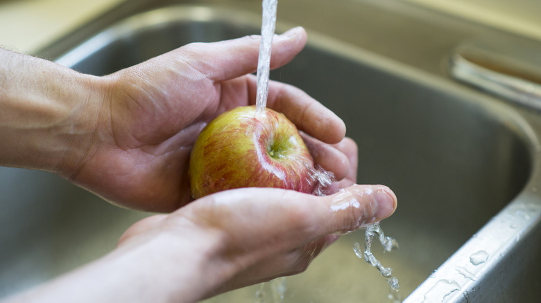 Washing an apple