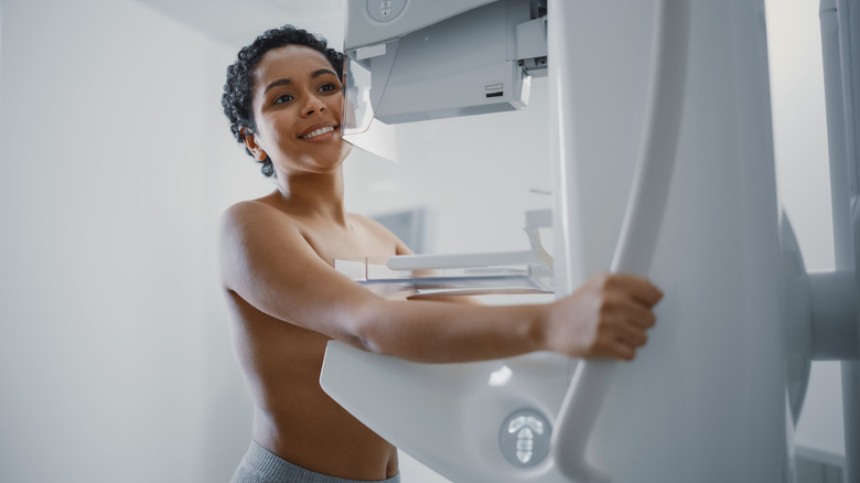 Black woman smiling during X-ray