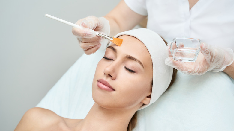 Woman getting a chemical peel